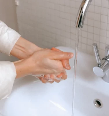 side view of hand washing