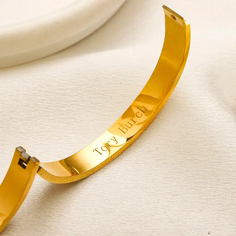 ZG3054 tory burch bangle shows